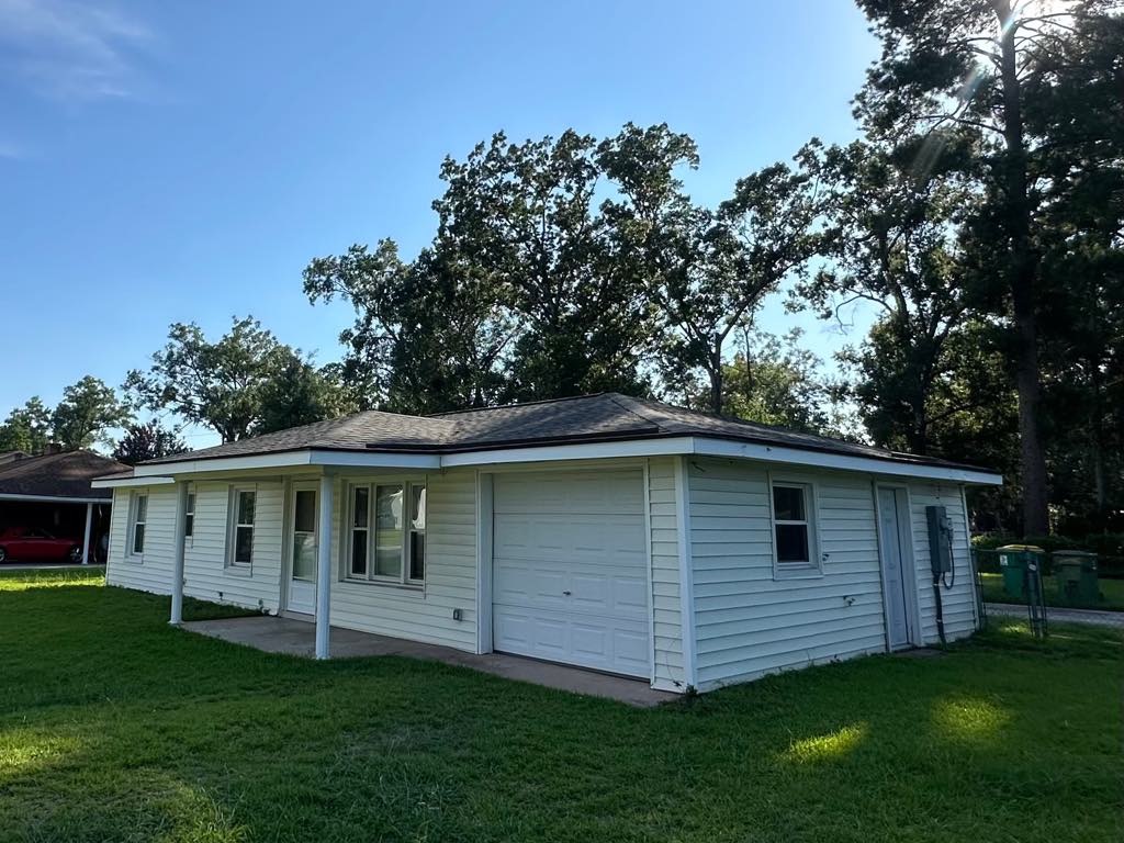 The same single-family home seen from the side, roof finished